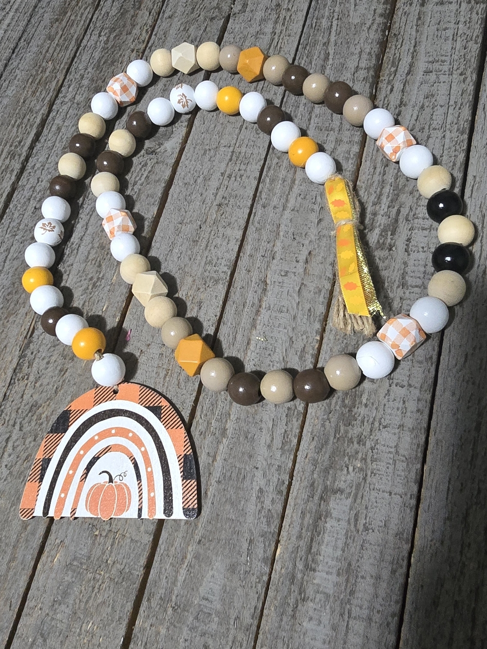 Wood Beaded Garland with Pumpkin Rainbow Pendant - Brown, White, Yellow